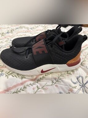 Women’s Nike Shoes, size 10. Black and maroon.